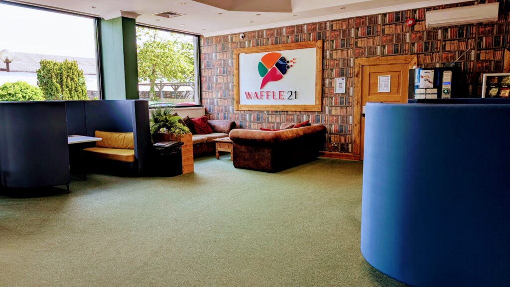 Waffle21 reception open Monday to Friday, 9am to 4pm, with welcoming seating and meeting booths